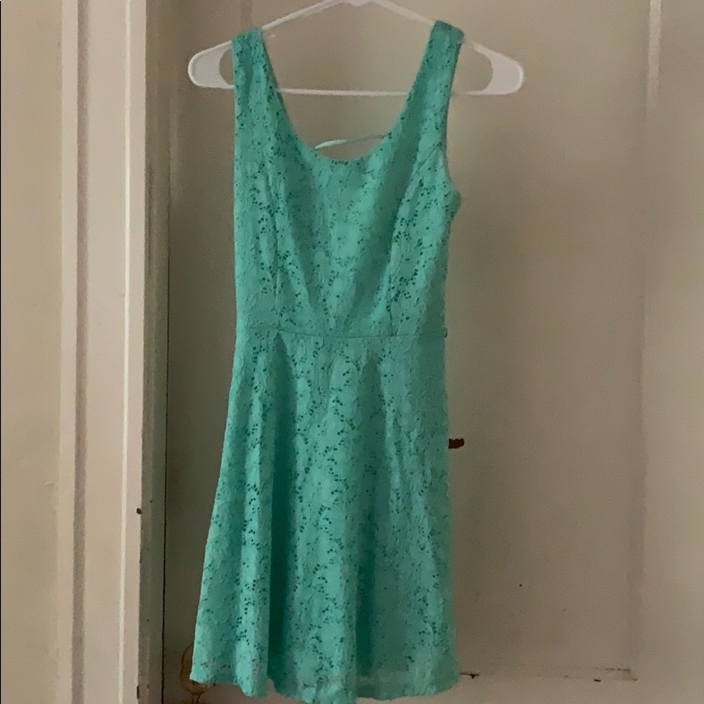 Lacey mint green dress open back